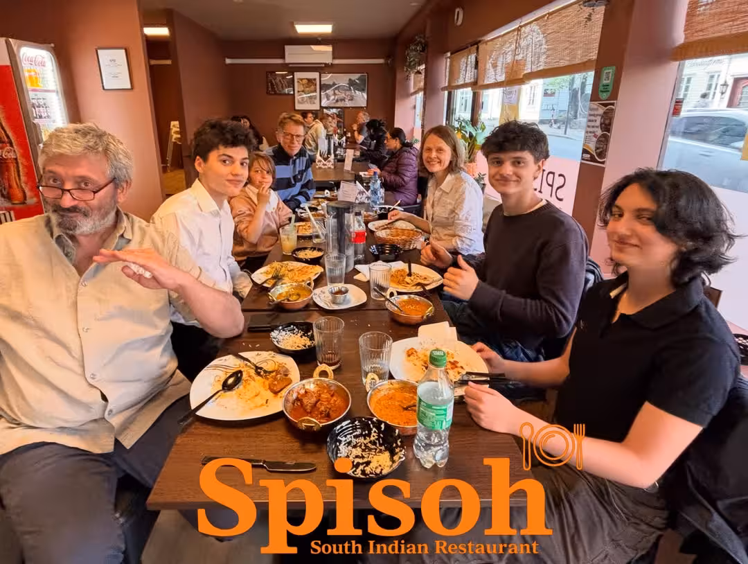 Happy people enjoying South Indian food at Spisoh
