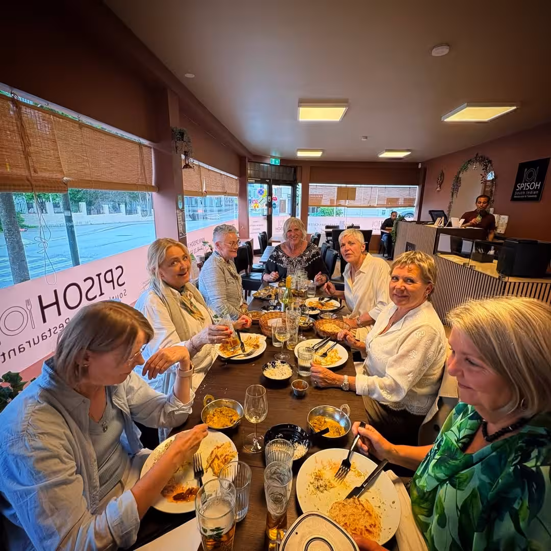 Happy people enjoying South Indian food at Spisoh